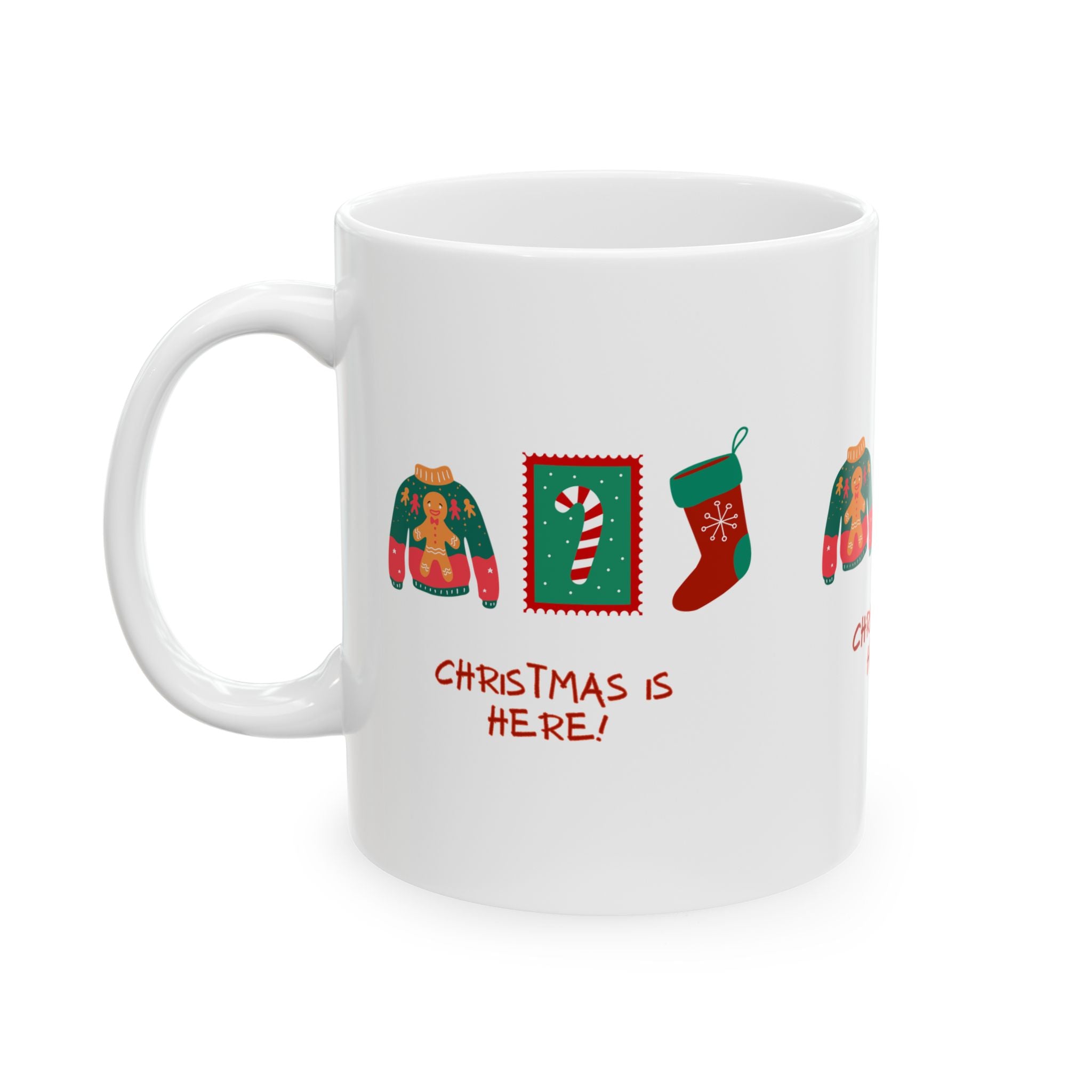 White mug with Christmas-themed designs and 'Christmas is Here!' text on a white background