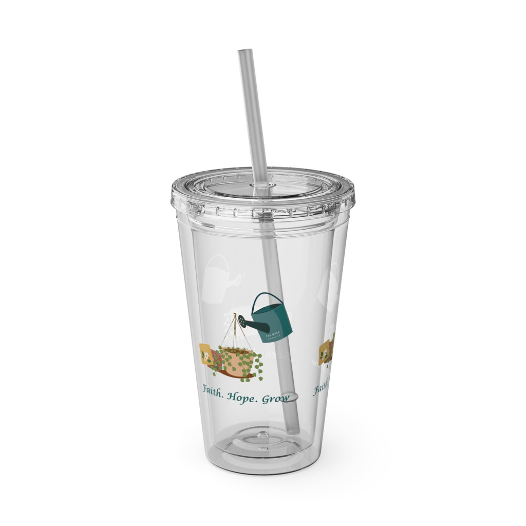 Clear tumbler with a straw featuring a design of a watering can and text on a white background