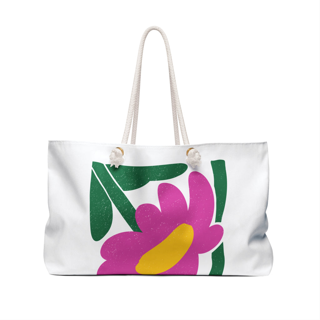 back view of White tote bag with colorful floral design on a white background