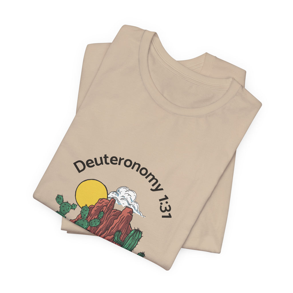 light brown t-shirt with desert design and 'Deuteronomy 1:31' text on a white background