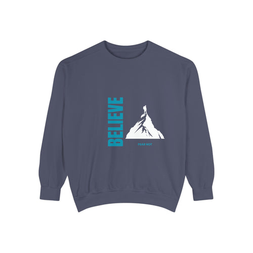 denim blue sweatshirt with 'BELIEVE' and mountain graphic on a white background