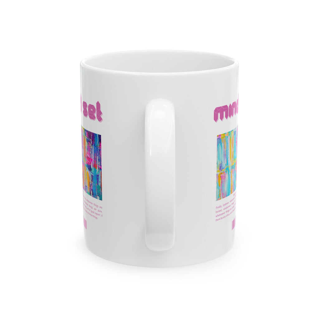 White mug with colorful text and graphics on a white background