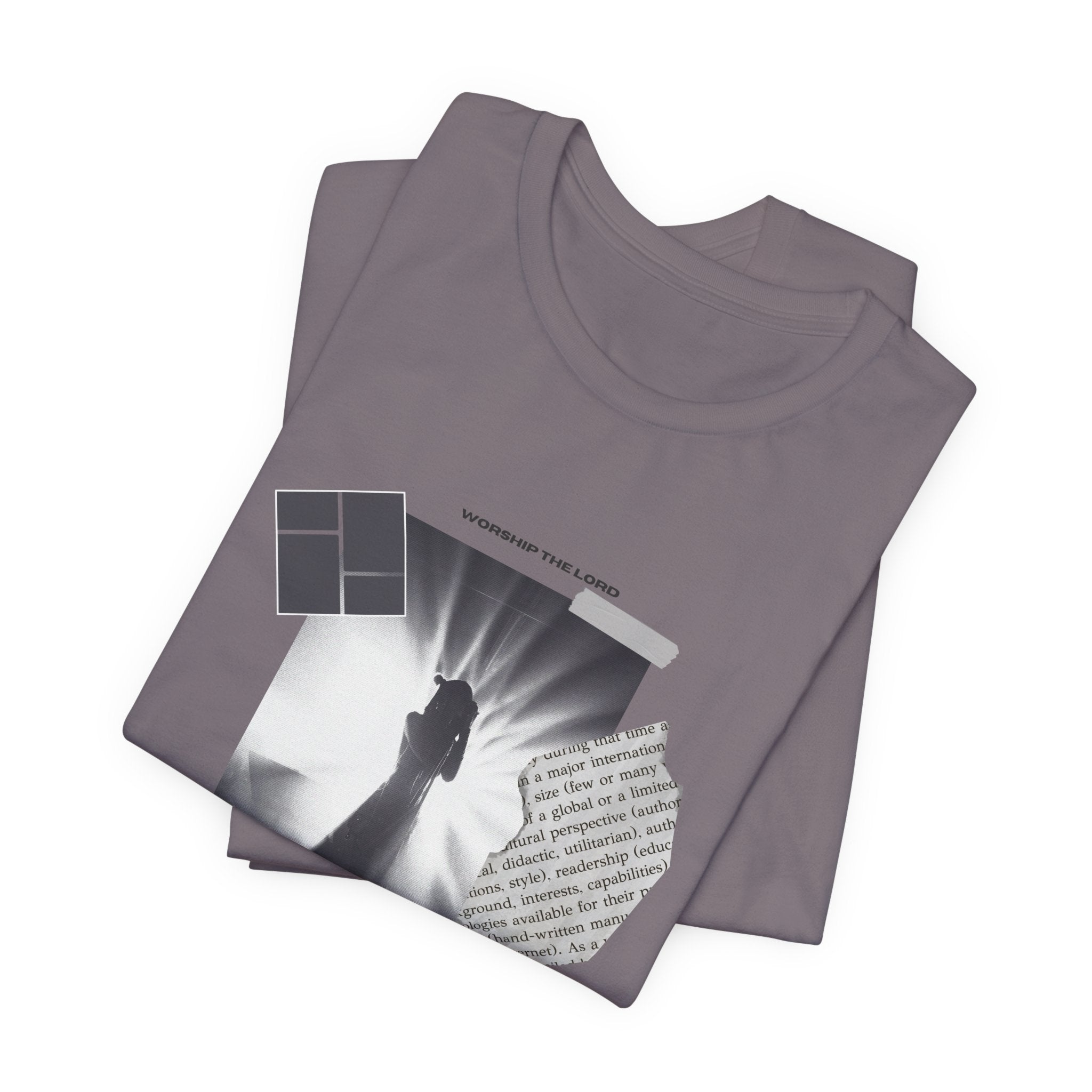 Stack of purple  t-shirts with a graphic design on a white background