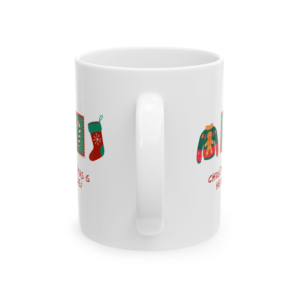 White mug with Christmas-themed designs on a white background