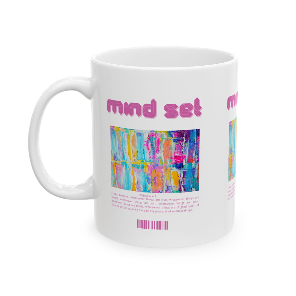 White mug with colorful abstract design and 'mind set' text on a white background
