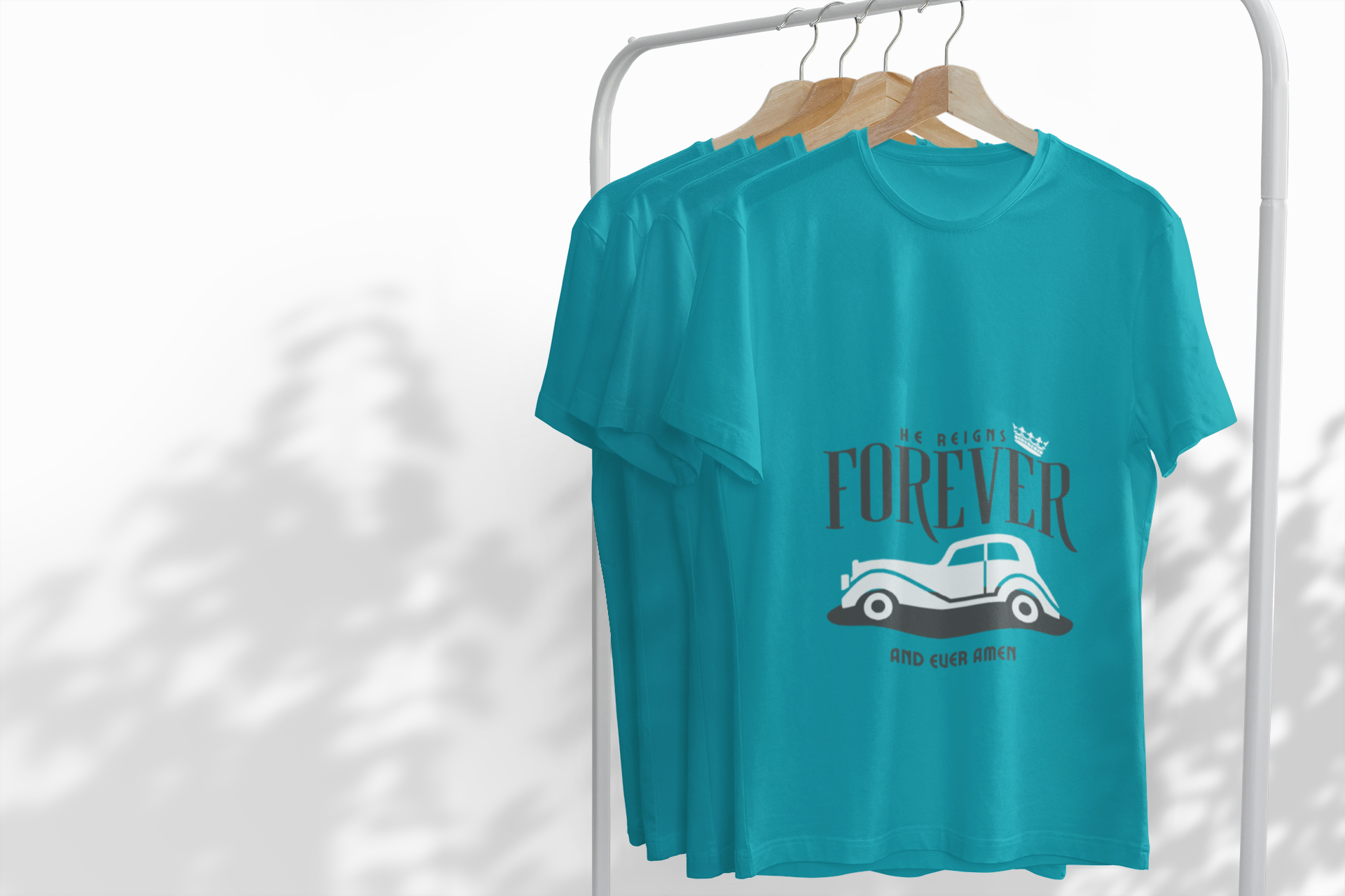 Turquoise t-shirt with graphic design on a white background