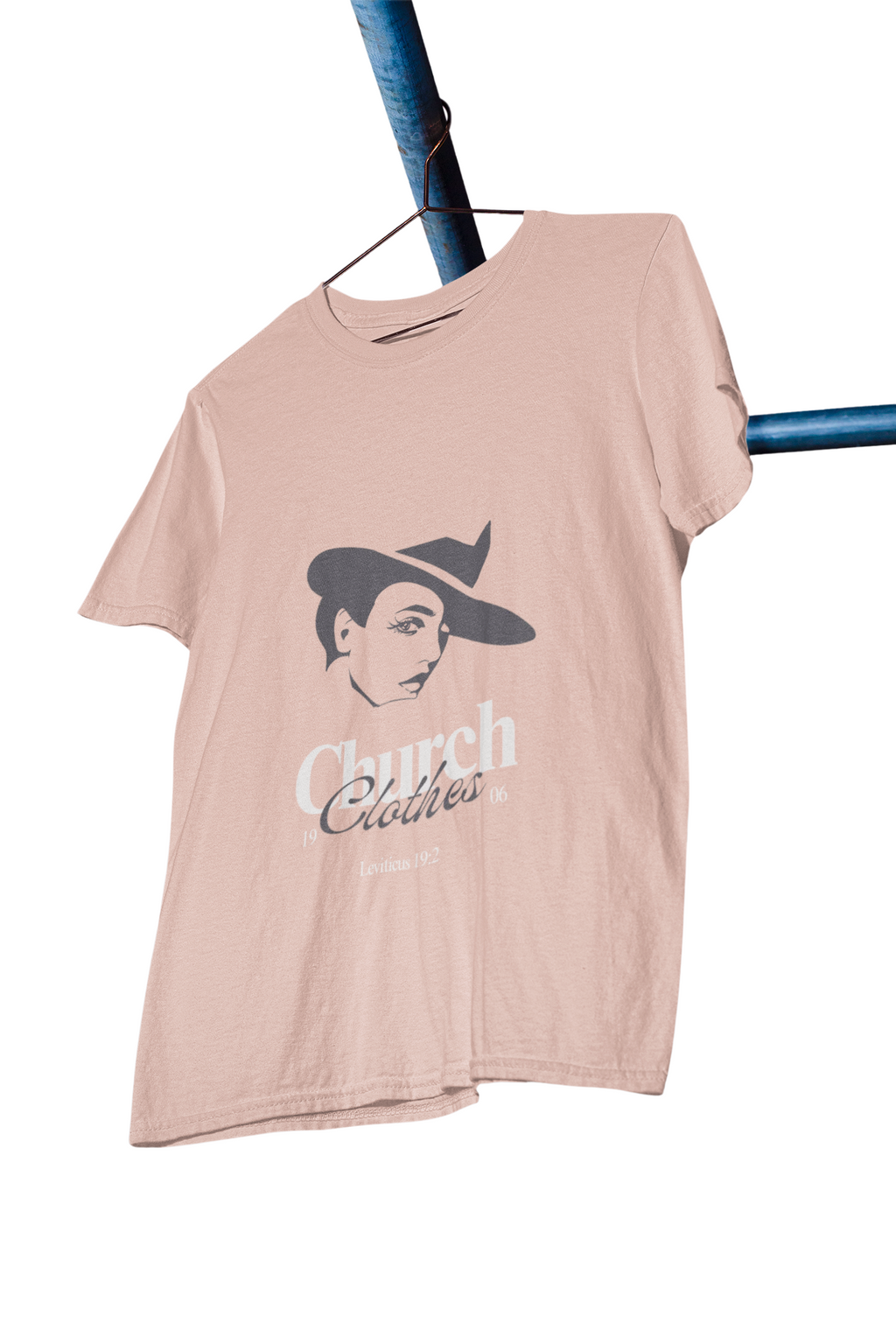 peach t-shirt with graphic design and text on a white background