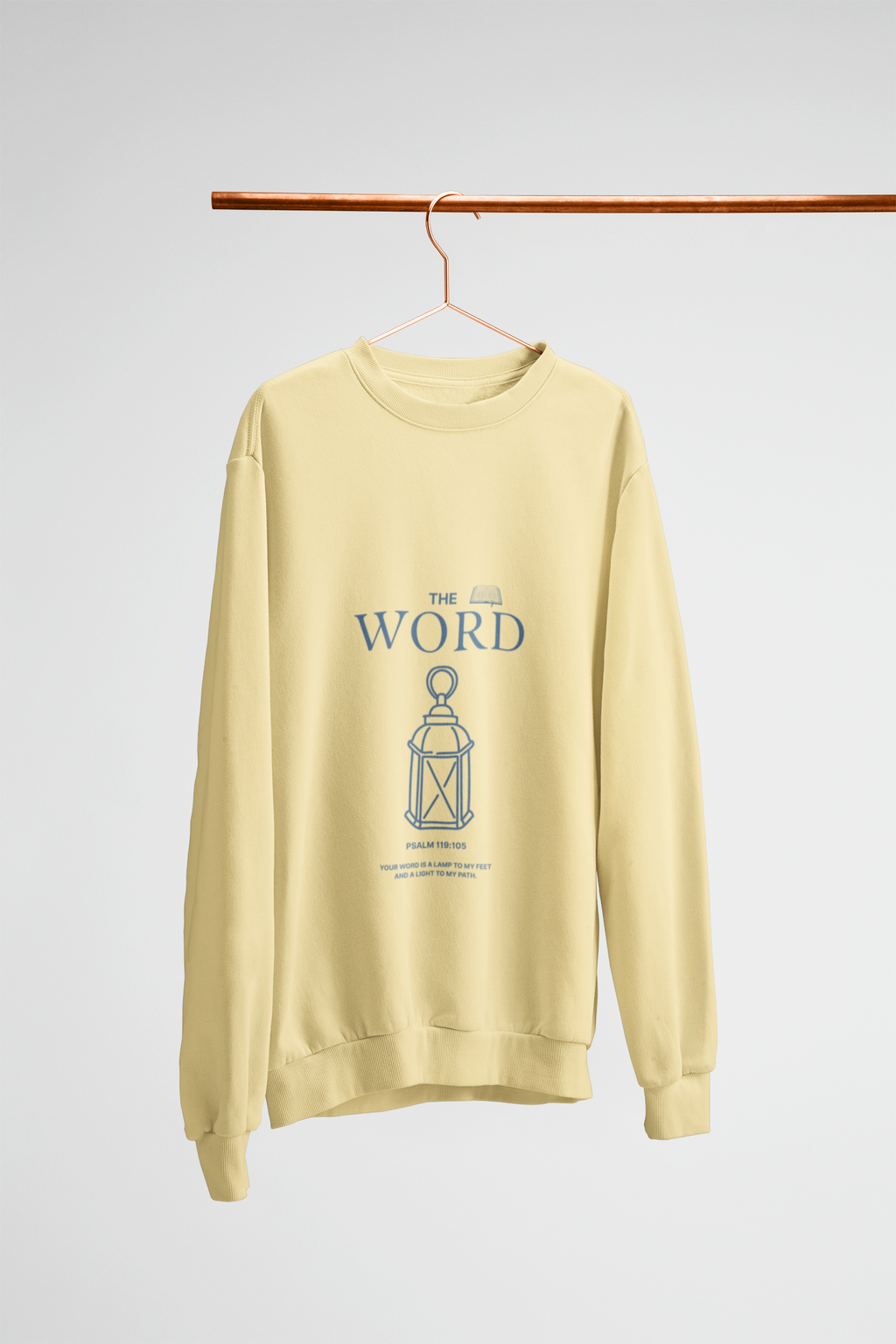 yellow sweatshirt with blue text and graphic on a hanger against a white background