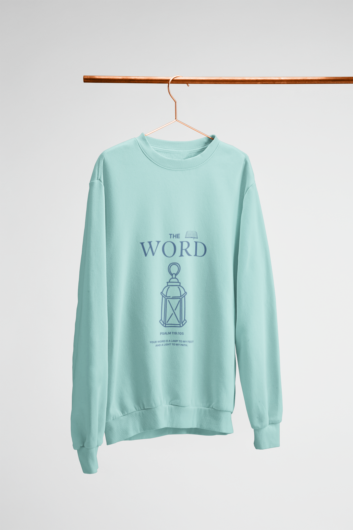 Light blue sweatshirt with text and graphic on a hanger against a white background