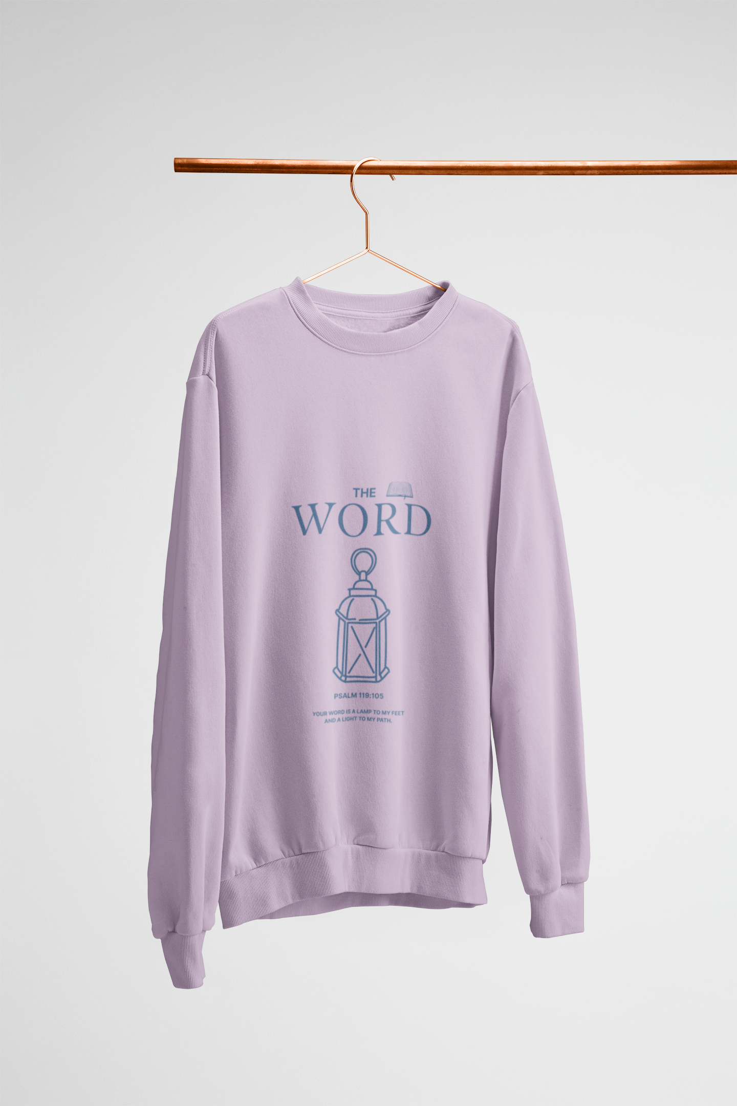 Purple sweatshirt with text and graphic on a hanger against a white background