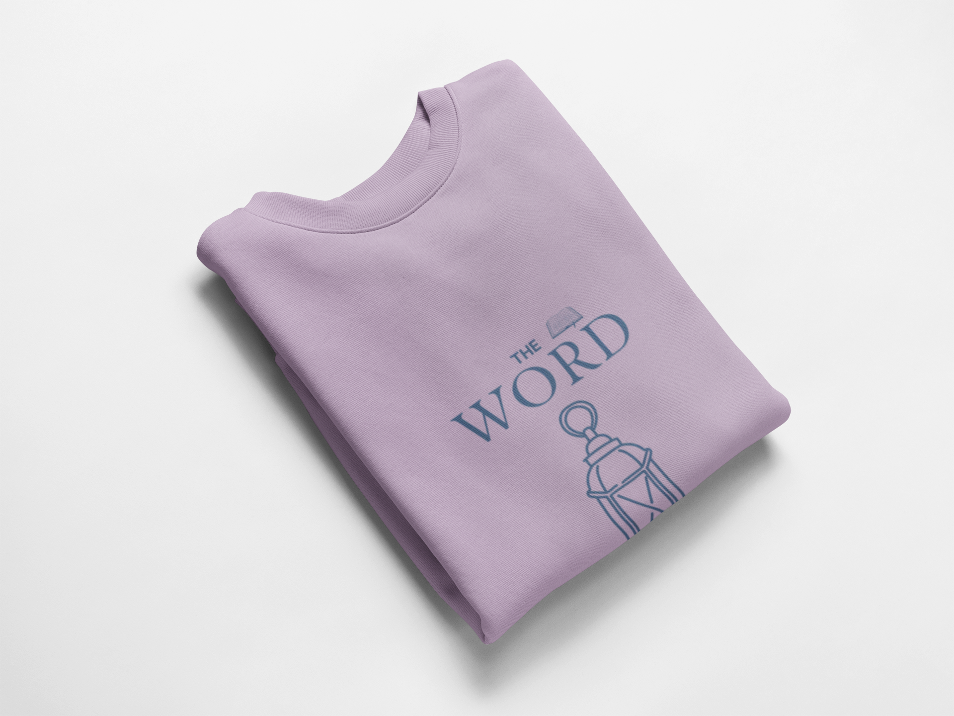 Folded purple sweatshirt with 'The Word' logo on a white background