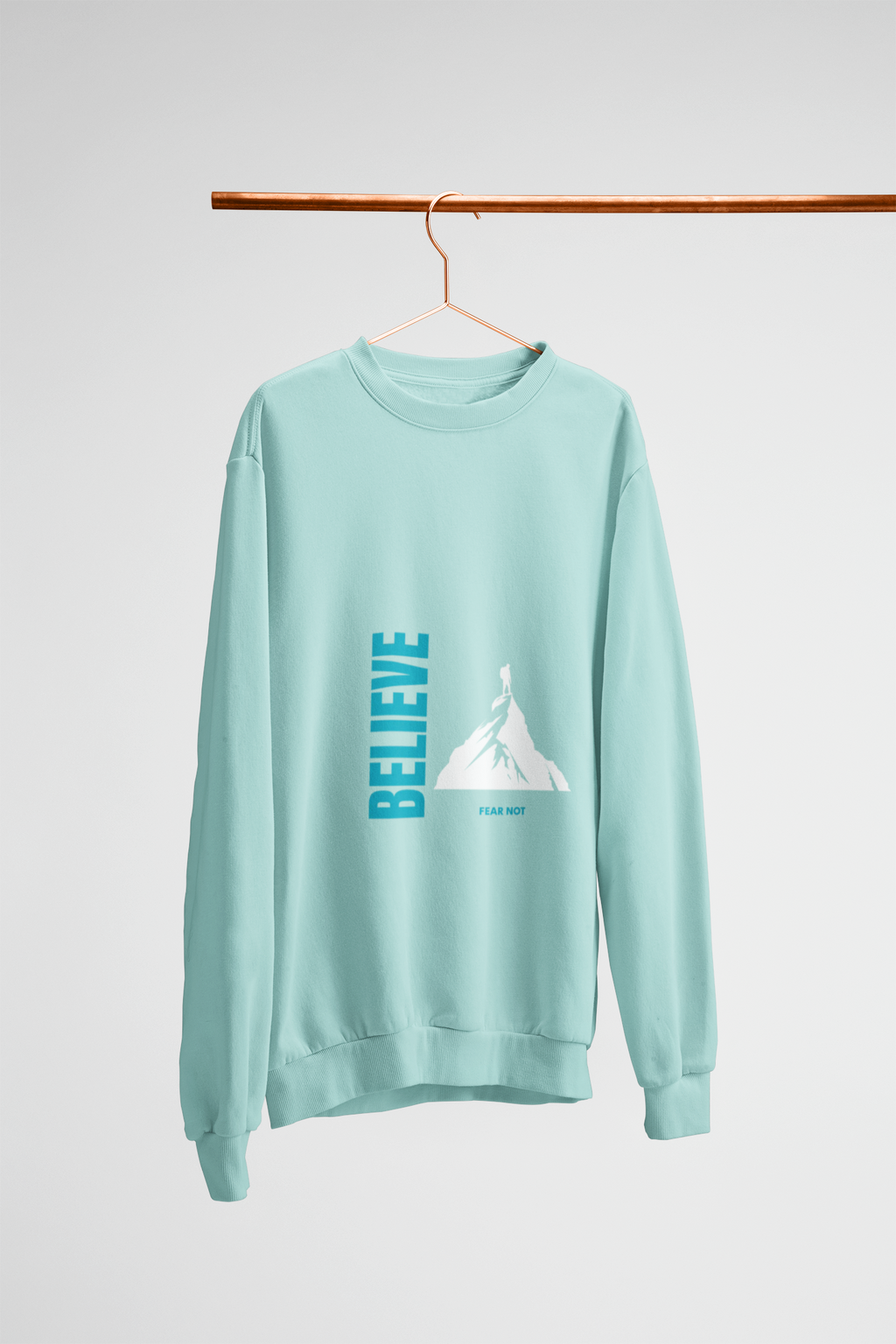 Light blue sweatshirt with graphic design on a hanger against a white background