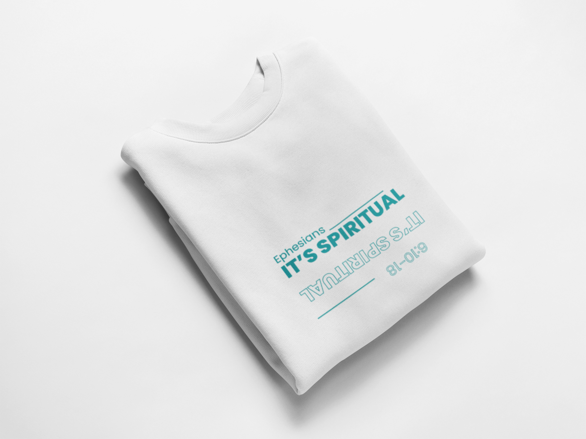 Folded white sweatshirt with blue text on a light gray background