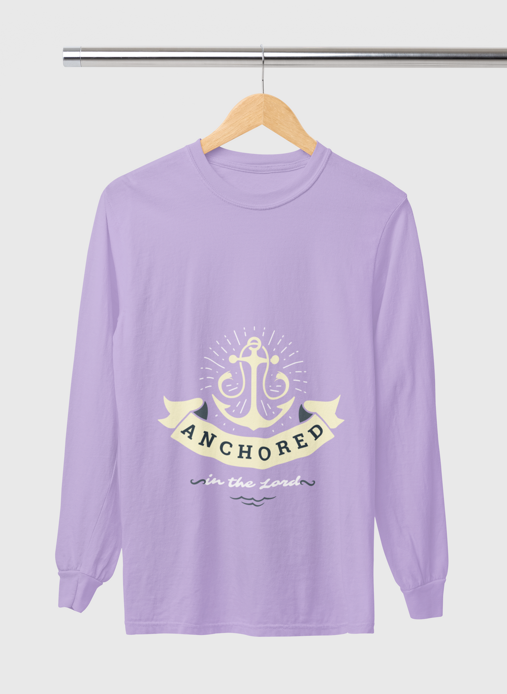 Purple long-sleeve shirt with anchor design and text on a hanger against a white background
