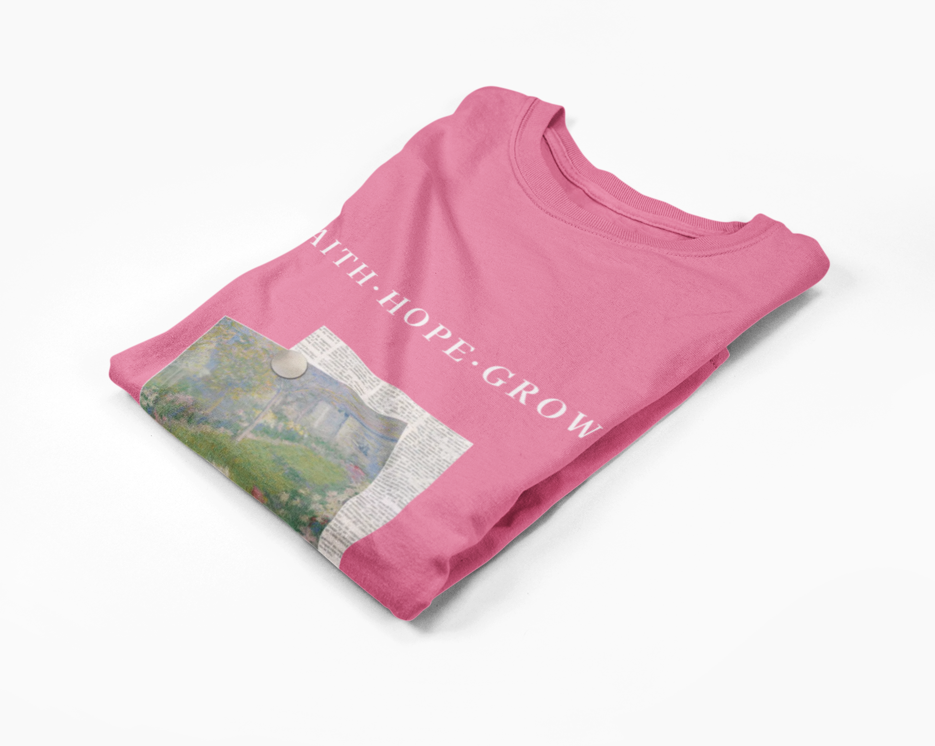 Pink t-shirt with printed design and text on a white background