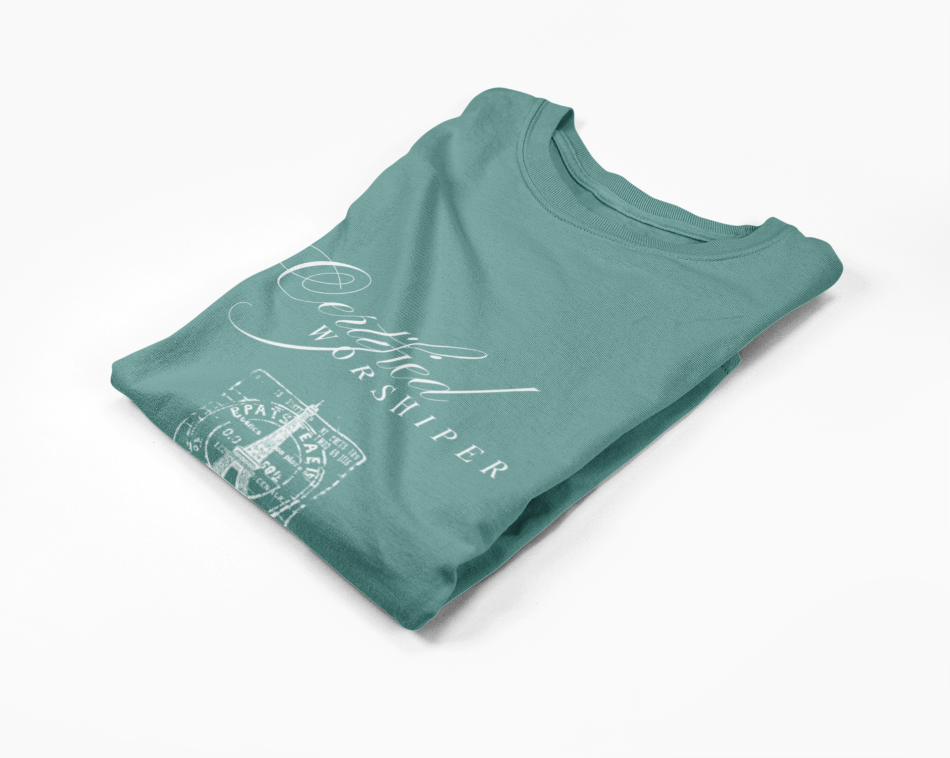 Folded teal shirt with white text on a white background