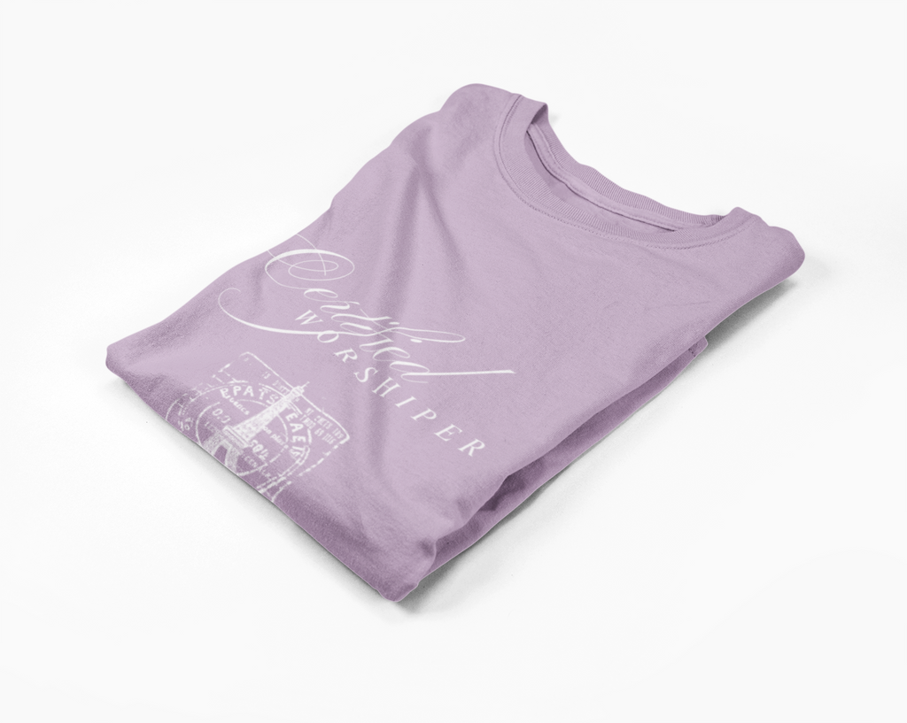 Folded purple shirt with text on a white background