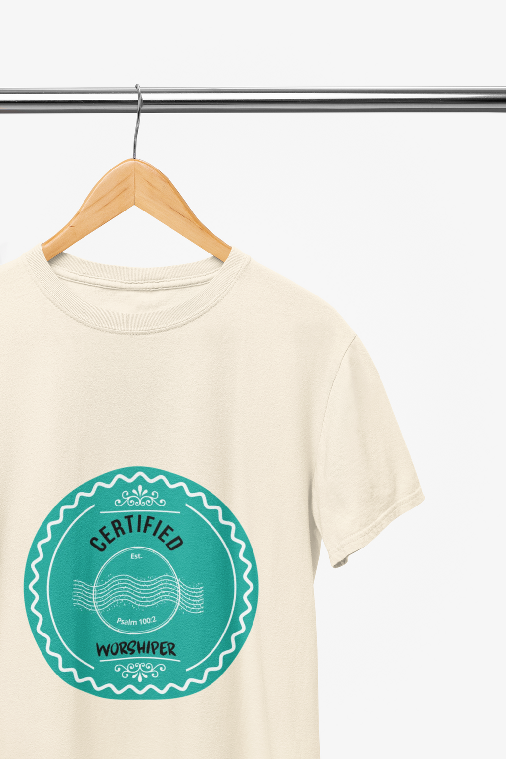 light Beige t-shirt with a teal logo on a hanger against a white background