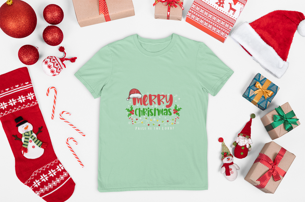 mint Green t-shirt with 'Merry Christmas' design surrounded by festive items on a white background