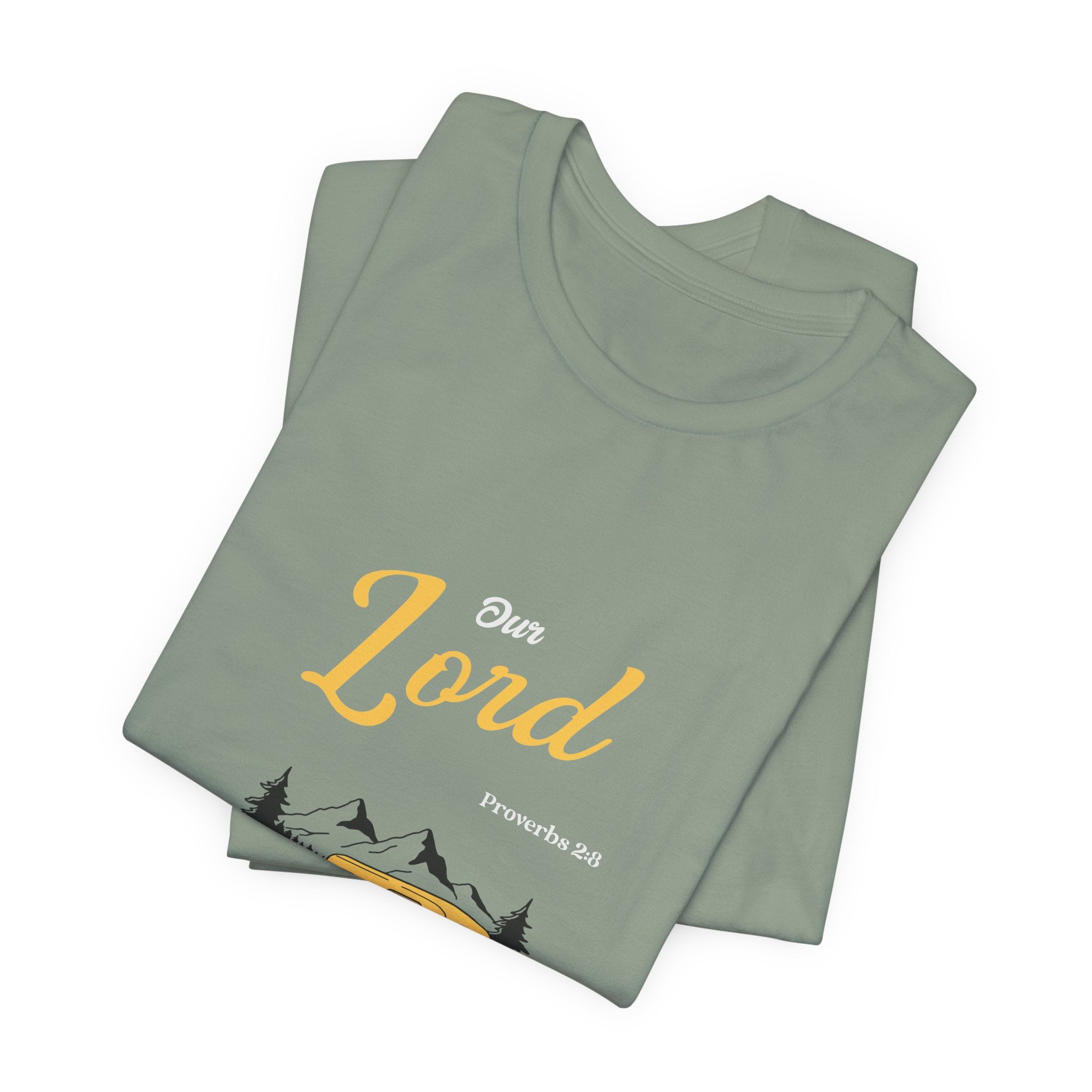 Folded green t-shirt with 'Our Lord' text on a white background