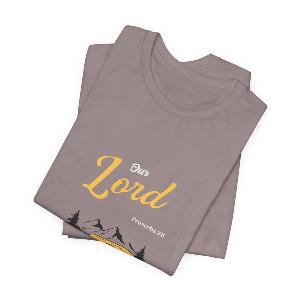 Stack of brown t-shirts with 'Our Lord' text on a white background