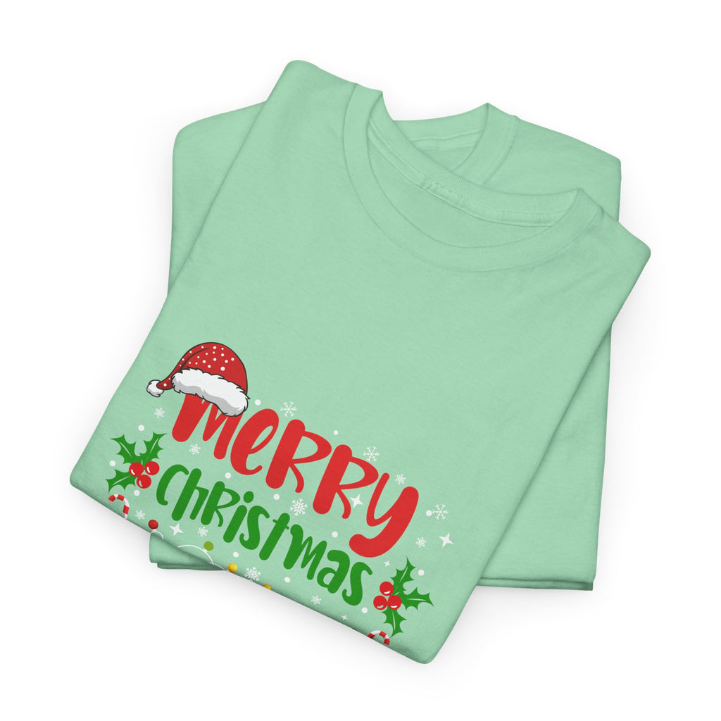 Folded mint green t-shirt with 'Merry Christmas' text  and graphic design on a white background