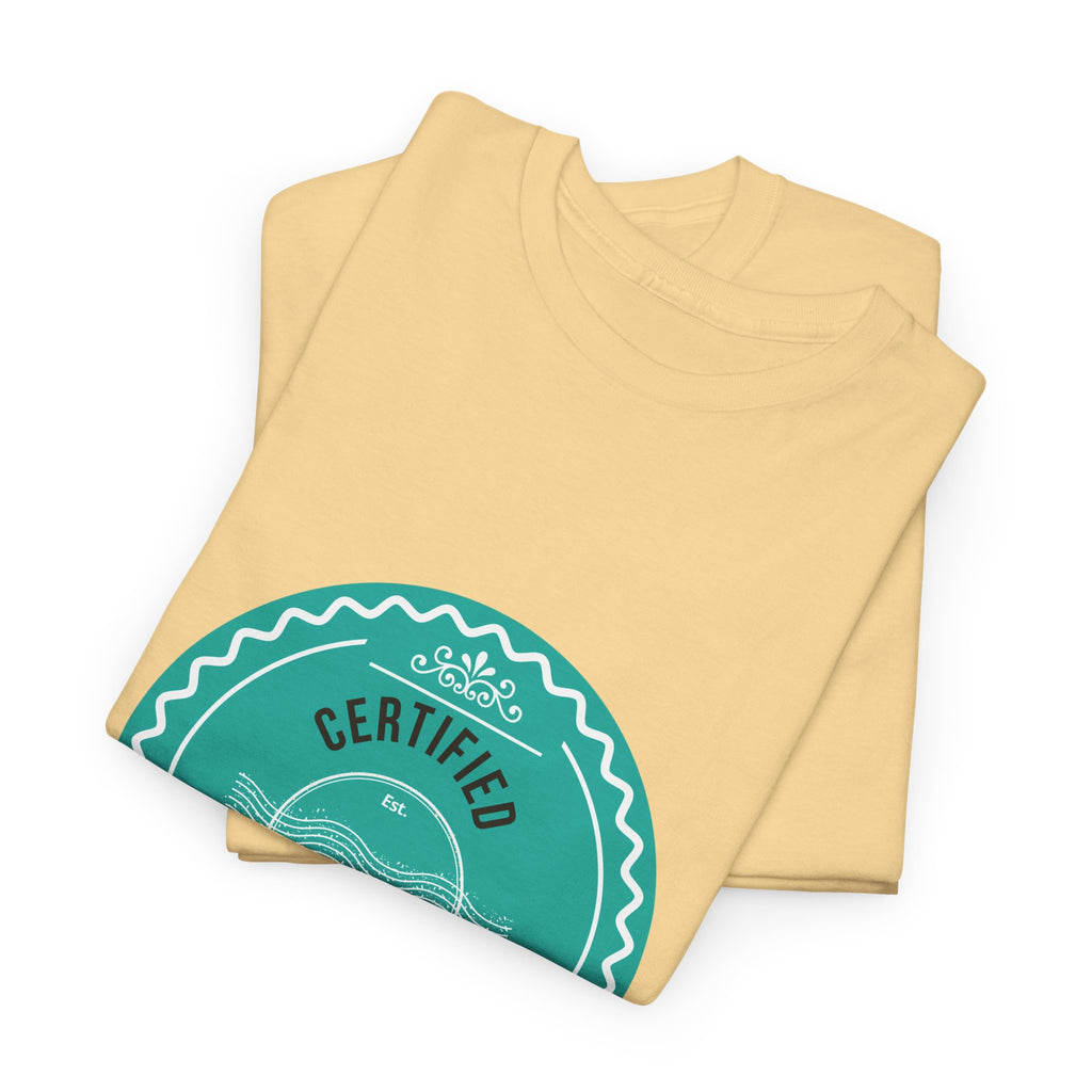 Folded yellow t-shirt with a teal 'Certified' label on a white background