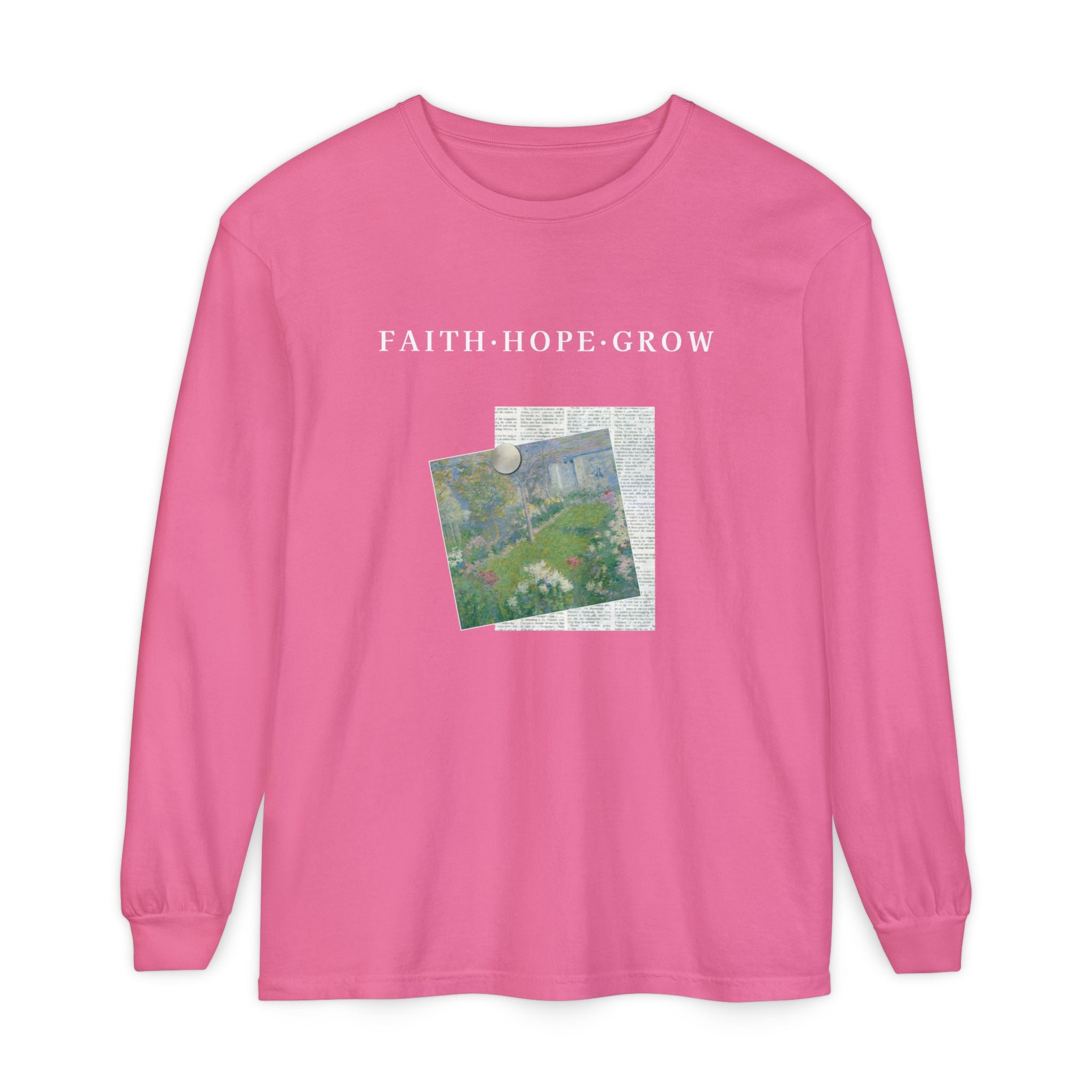 Pink long-sleeve shirt with 'FAITH HOPE GROW' text and a graphic design on a white background