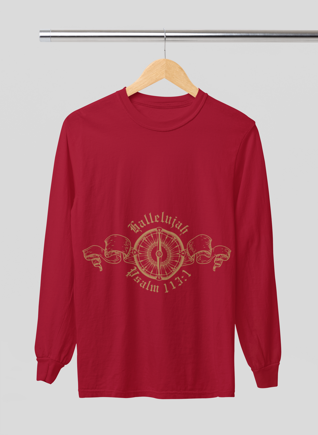 Red long-sleeve shirt with gold design and text on a hanger against a gray background