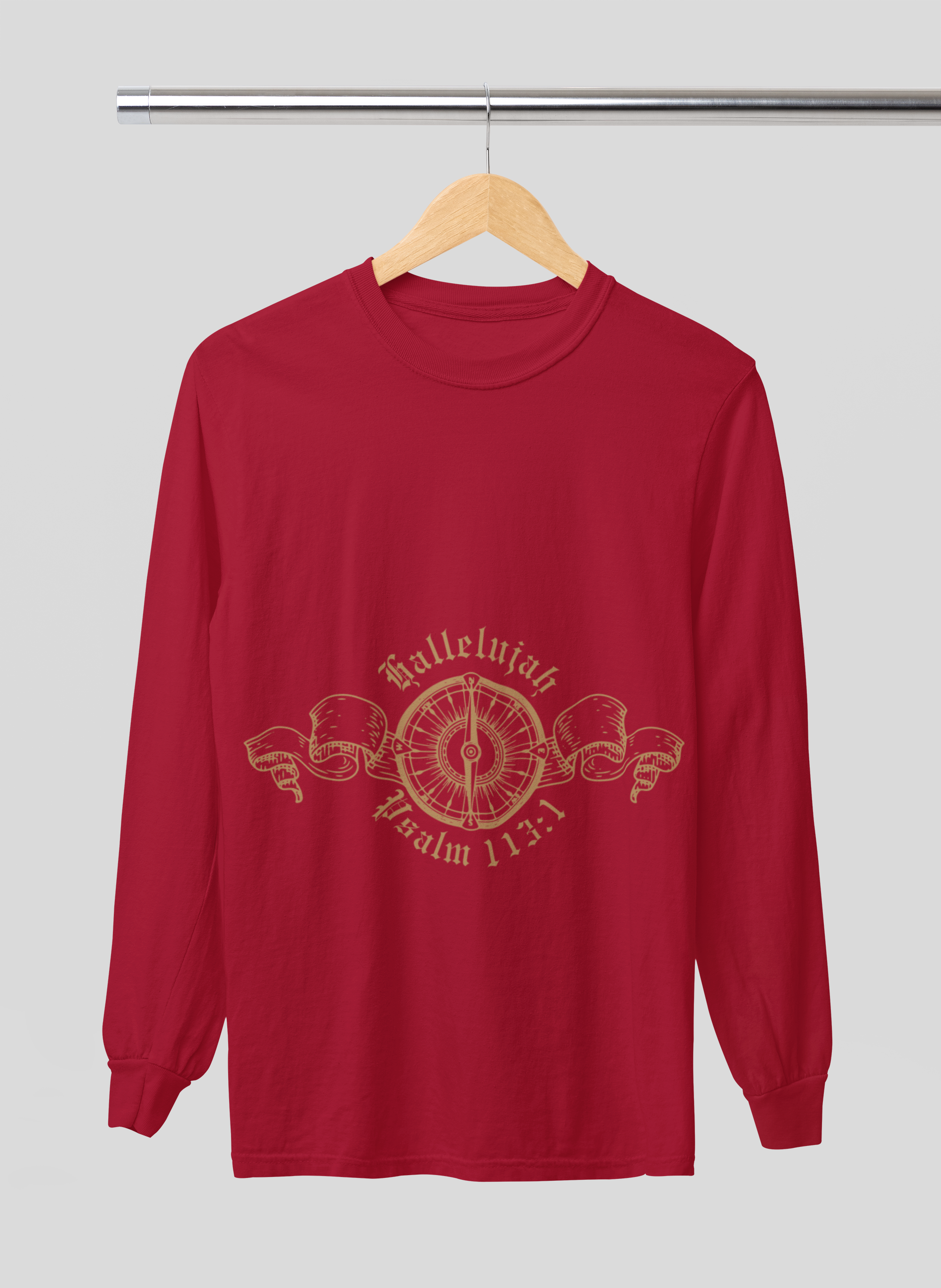 Red long-sleeve shirt with gold design and text on a hanger against a gray background