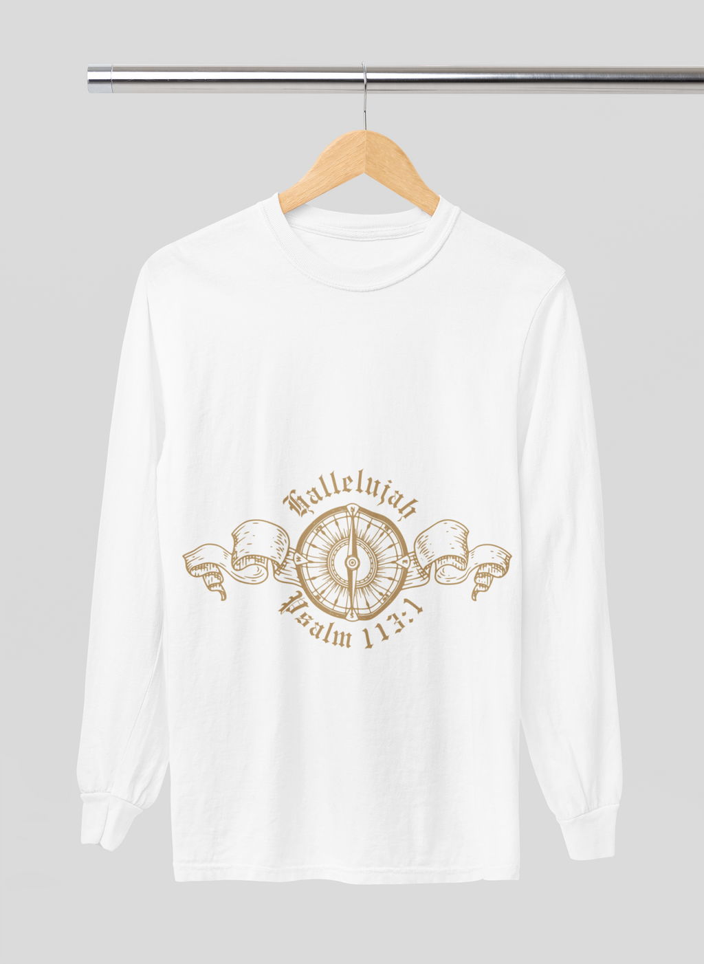 White long-sleeve shirt with gold compass design on a hanger against a gray background