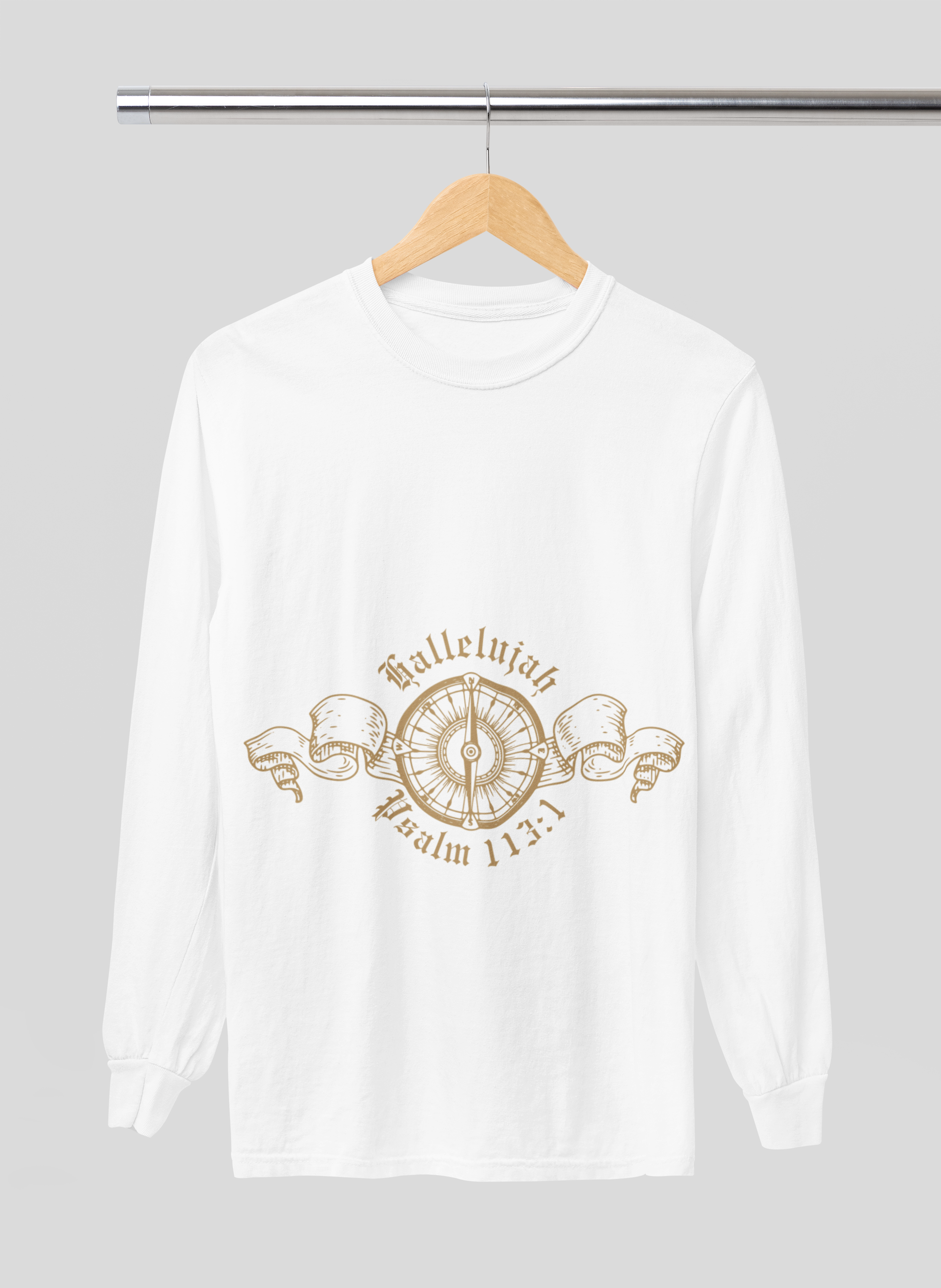 White long-sleeve shirt with gold compass design on a hanger against a gray background
