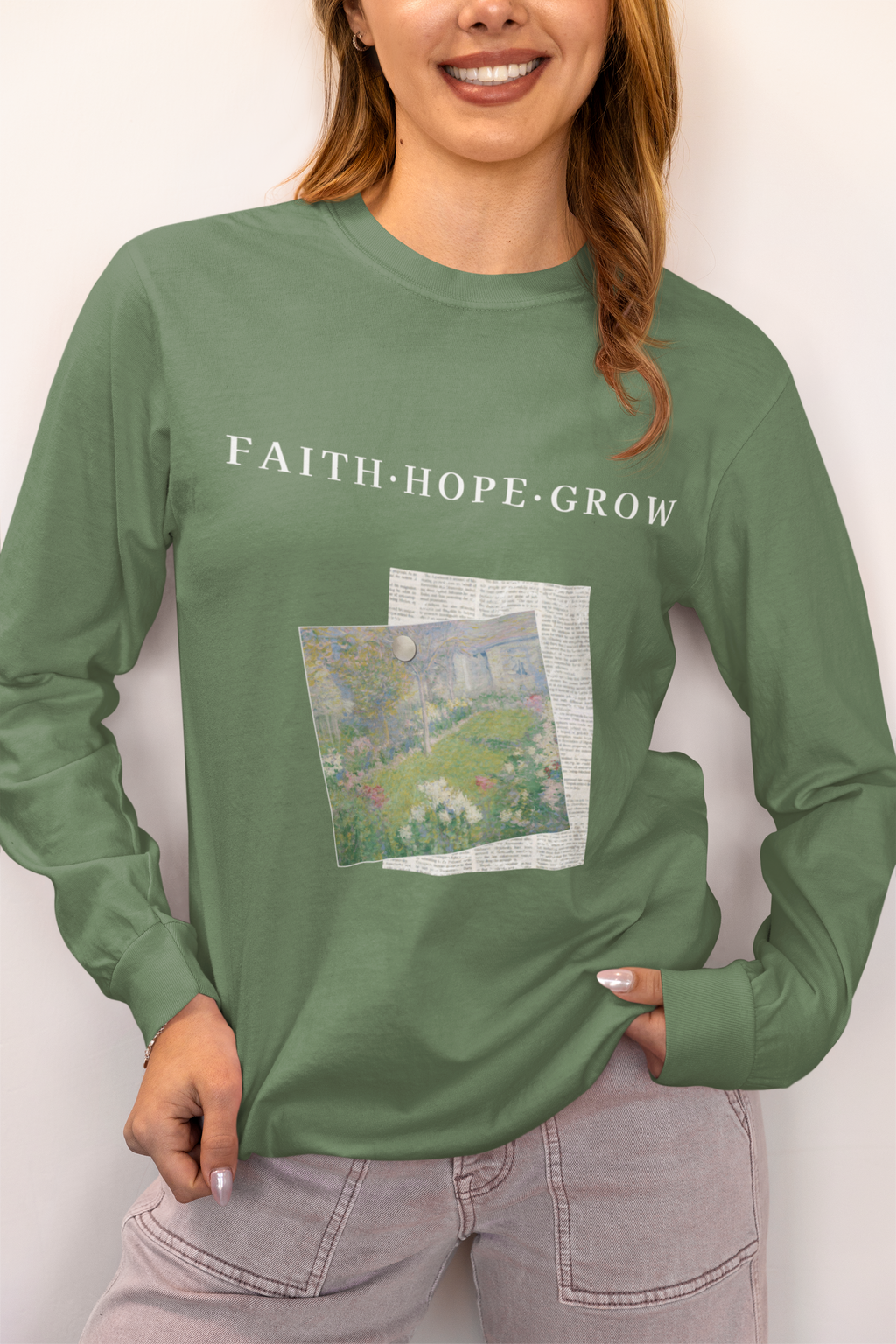 Person wearing a green long-sleeve shirt with 'FAITH HOPE GROW' text and a graphic design.
